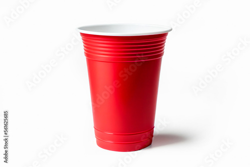 Close up red plastic party cup on isolated white background with clipping path.