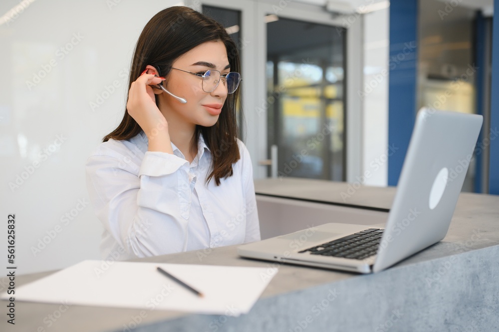 Support phone operator in headset at workplace Support phone operator in headset at workplace