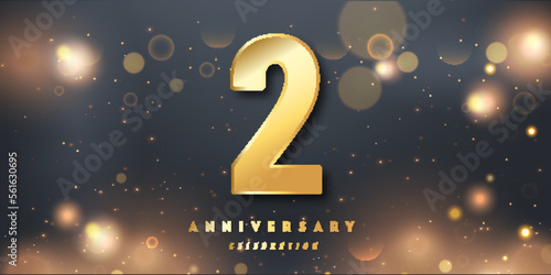 2nd Year anniversary celebration background. 3D Golden number with Shiny Glitter lights In black dark night background.