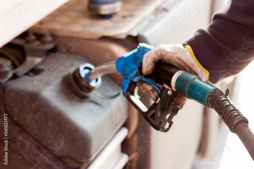 Foto truck driver refueling AdBlue in heavy-duty vehicle, Euro6 standard, reduce CO2