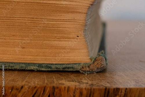 old book on wooden table
