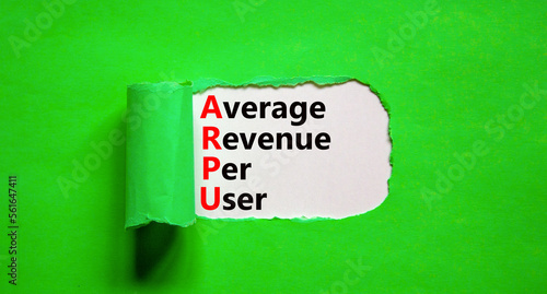 ARPU average revenue per user symbol. Concept words ARPU average revenue per user on white paper on beautiful green background. Business ARPU average revenue per user concept. Copy space.