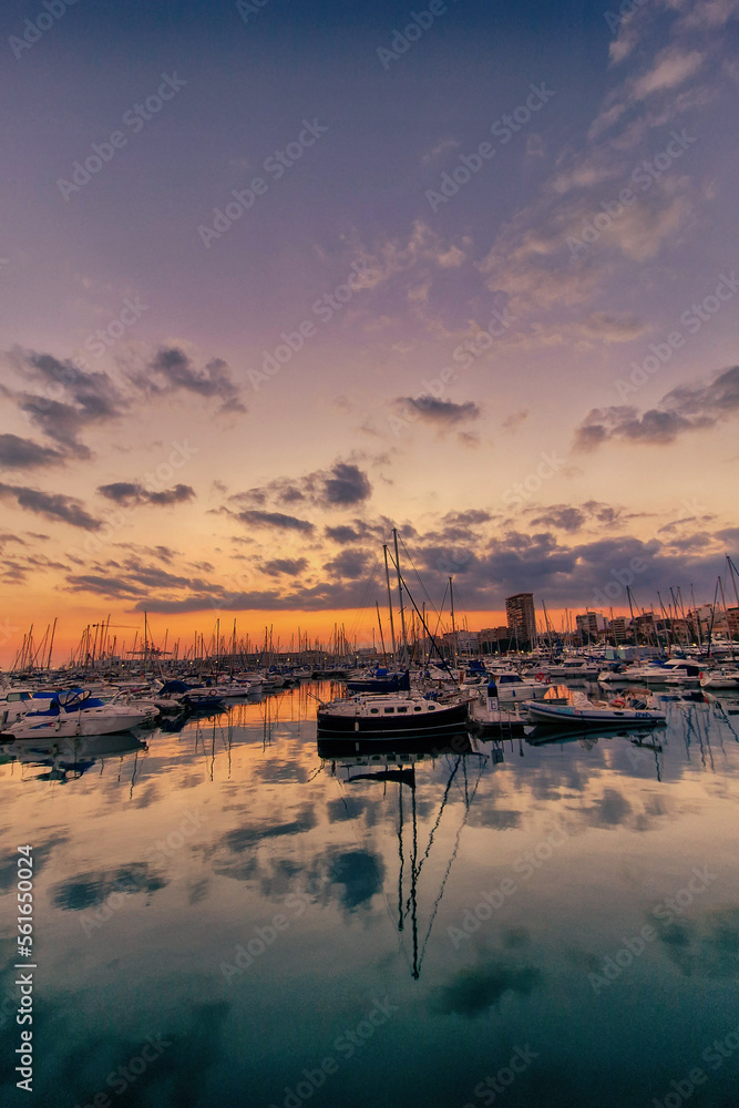 sunset in the port of Alicante, Spain with yachts