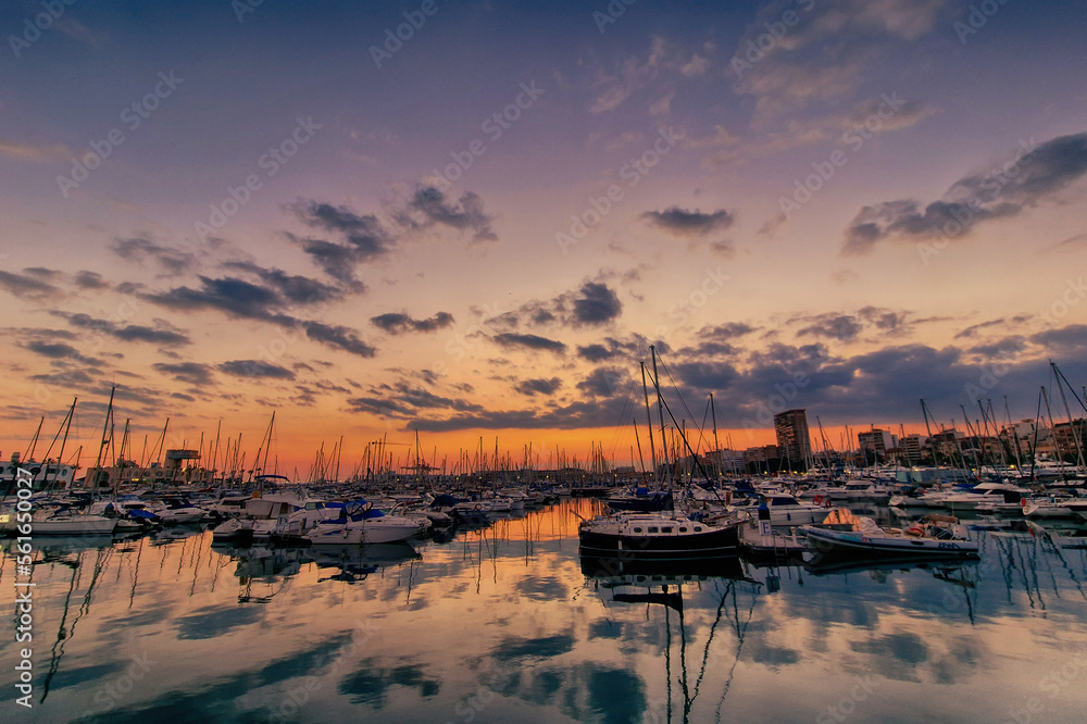 sunset in the port of Alicante, Spain with yachts sunset in the port of Alicante, Spain with yachts