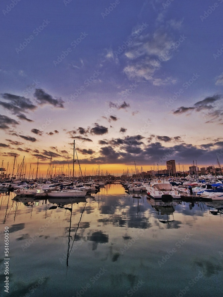 sunset in the port of Alicante, Spain with yachts
