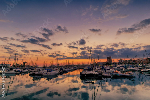 sunset in the port of Alicante, Spain with yachts