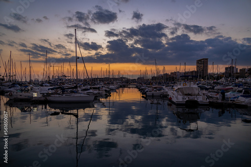 sunset in the port of Alicante, Spain with yachts © Joanna Redesiuk