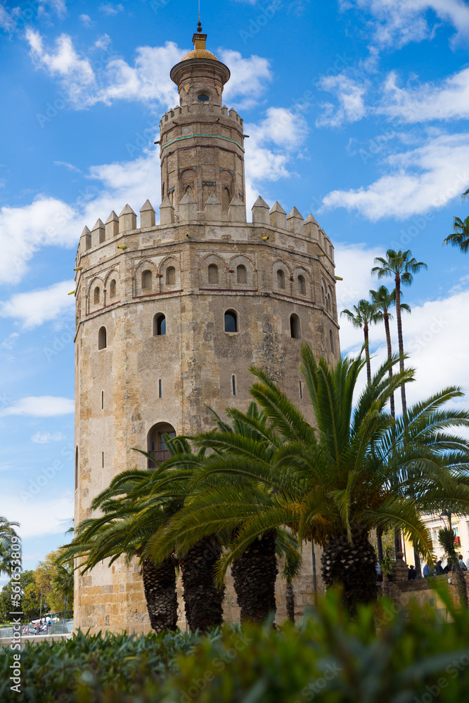 View of Tower of gold (Torre del Oro) in Spanish city of Seville in sunny spring day