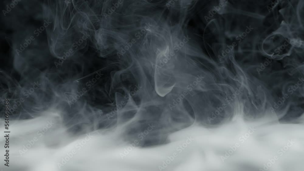 Super Slow Motion Shot of Abstract Flowing Smoke Isolated on Black at 1000fps. Super Slow Motion Shot of Abstract Flowing Smoke Isolated on Black at 1000fps.