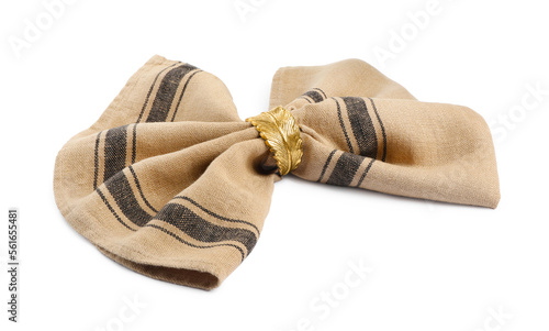 Fabric napkin with decorative ring on white background