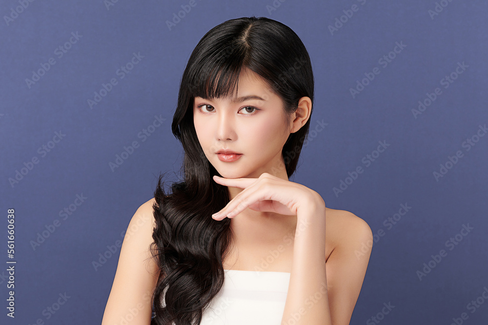 Beautiful young asian woman with clean fresh skin on blue background, Face care, Facial treatment, Cosmetology, beauty and spa, Asian women portrait. Beautiful young asian woman with clean fresh skin on blue background, Face care, Facial treatment, Cosmetology, beauty and spa, Asian women portrait.