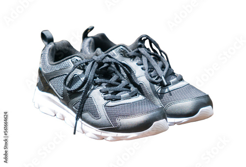 Pair of black color sport shoes with shoe laces. Isolated.