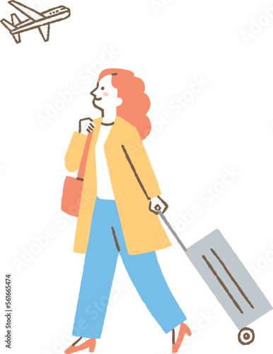 旅行のため空港に向かう女性_色