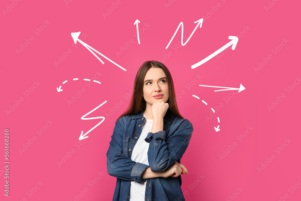 Choice in profession or other areas of life, concept. Making decision, thoughtful young woman surrounded by drawn arrows on pink background - obrazy, fototapety, plakaty 