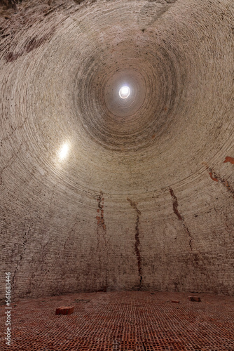 Interior of empty brick kiln in Vinh Long in the Mekong Delta in Vietnam. Vertical format.