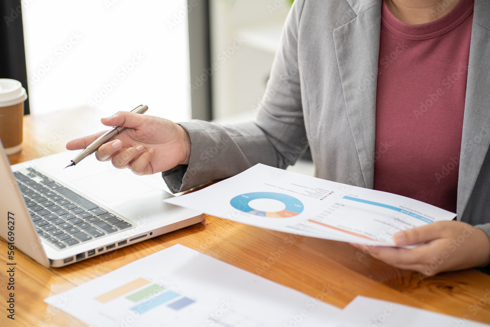 Auditor or internal revenue service staff, Business women checking annual financial statements of company. Audit Concept. Auditor or internal revenue service staff, Business women checking annual financial statements of company. Audit Concept.