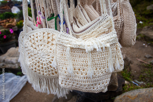 Handmade knitted bags produced by small home industries are souvenirs for tourists at the Mount Tangkuban Parahu tourist spot in Bandung, Indonesia. Sold in stalls around the crater. photo