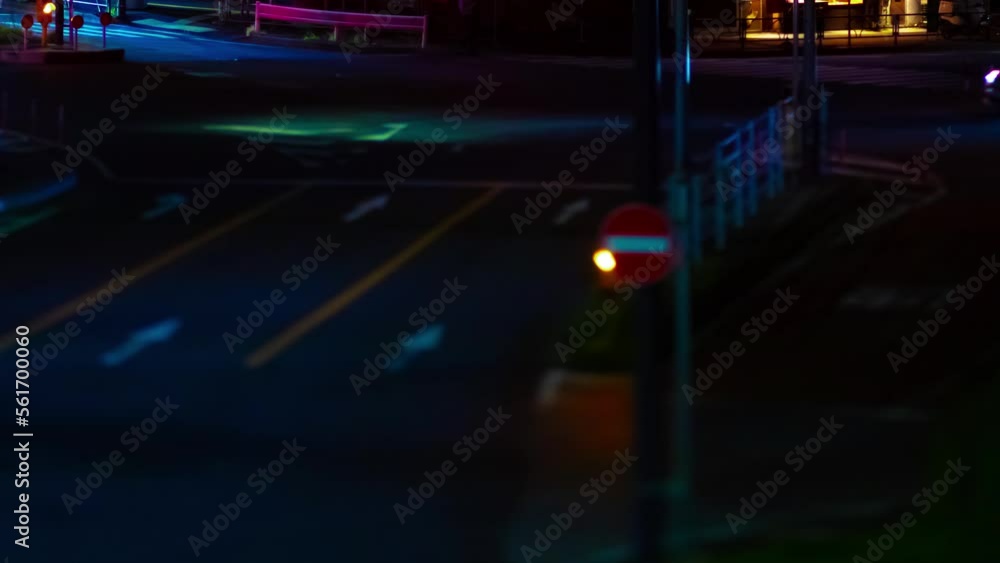 A night timelapse of the miniature traffic jam in Tokyo panning A night timelapse of the miniature traffic jam in Tokyo panning