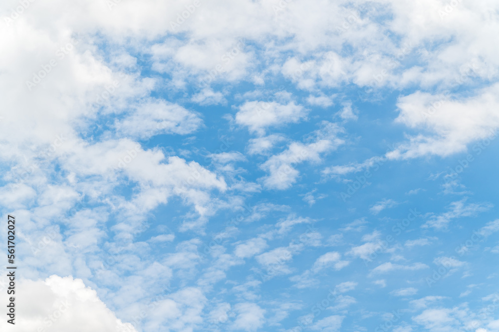 Nature background from white clouds in sunny day. Beautiful white fluffy clouds in blue sky. Nature background from white clouds in sunny day. Beautiful white fluffy clouds in blue sky.