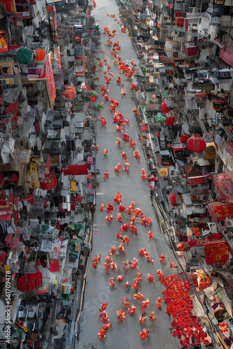  Chinese New Year celebration. Group of people perform a traditional lion dance. generative ai photo