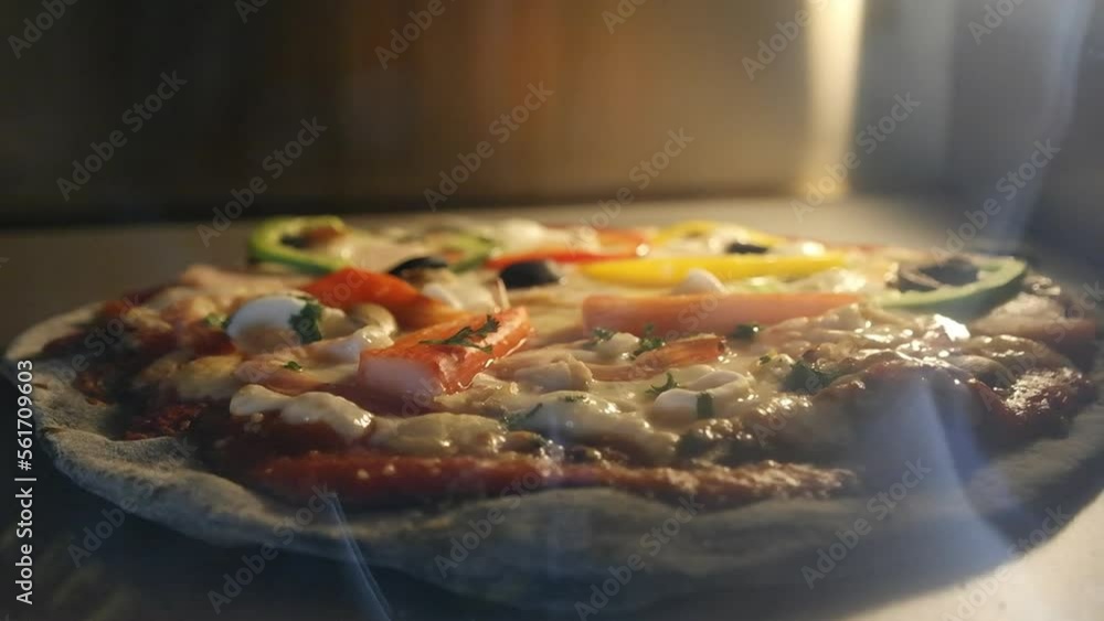Preparing sea food pizza in oven Preparing sea food pizza in oven