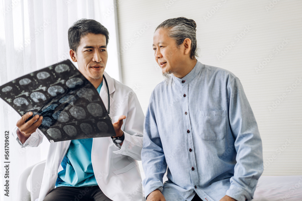 Asian man doctor service help support discussing and consulting talk to asian sick senior man patient at meeting health medical care trust concept in hospital.healthcare and medicine Asian man doctor service help support discussing and consulting talk to asian sick senior man patient at meeting health medical care trust concept in hospital.healthcare and medicine