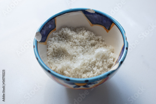 A view of a condiment cup of French sea salt.