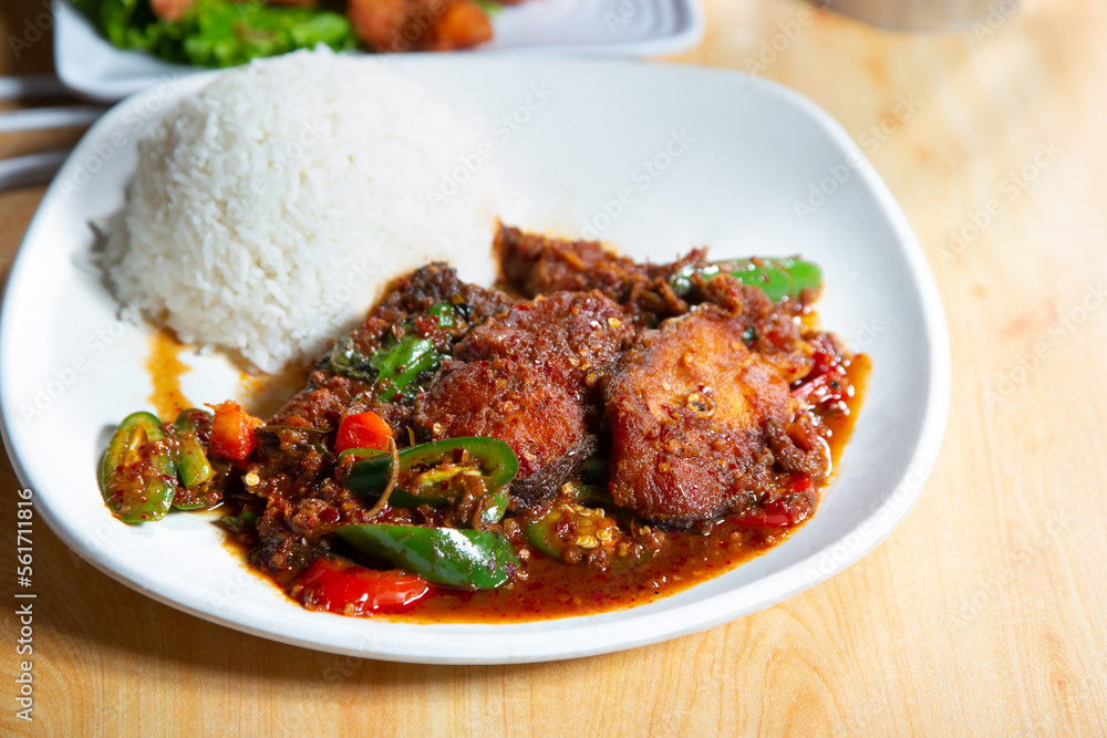 A view of a plate of spicy chili chicken.