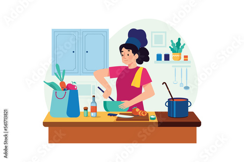 The girl is preparing dinner in the kitchen