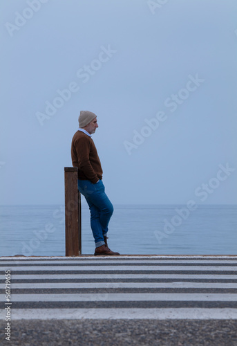 Fototapeta Naklejka Na Ścianę i Meble -  Portrait of adult man against sea