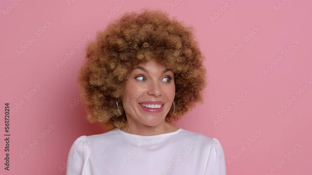 Great job. Positive cheerful creative woman employee makes like gesture, she agrees, positively reacts and smiles, isolated next to pink background Great job. Positive cheerful creative woman employee makes like gesture, she agrees, positively reacts and smiles, isolated next to pink background