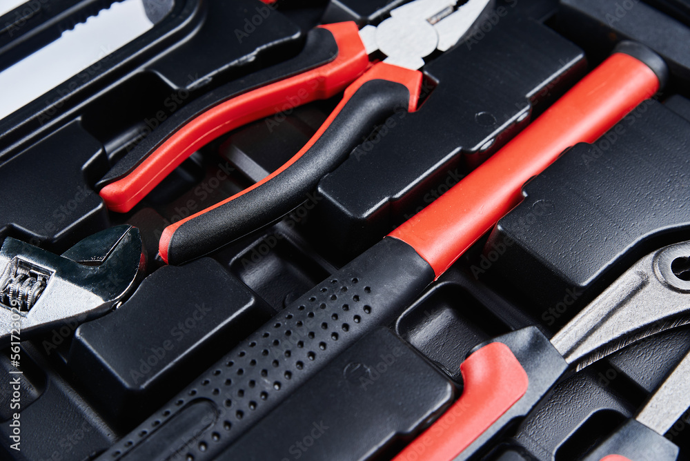 Toolbox with hand instruments for repair, close up. Set of tools for maintenance Toolbox with hand instruments for repair, close up. Set of tools for maintenance