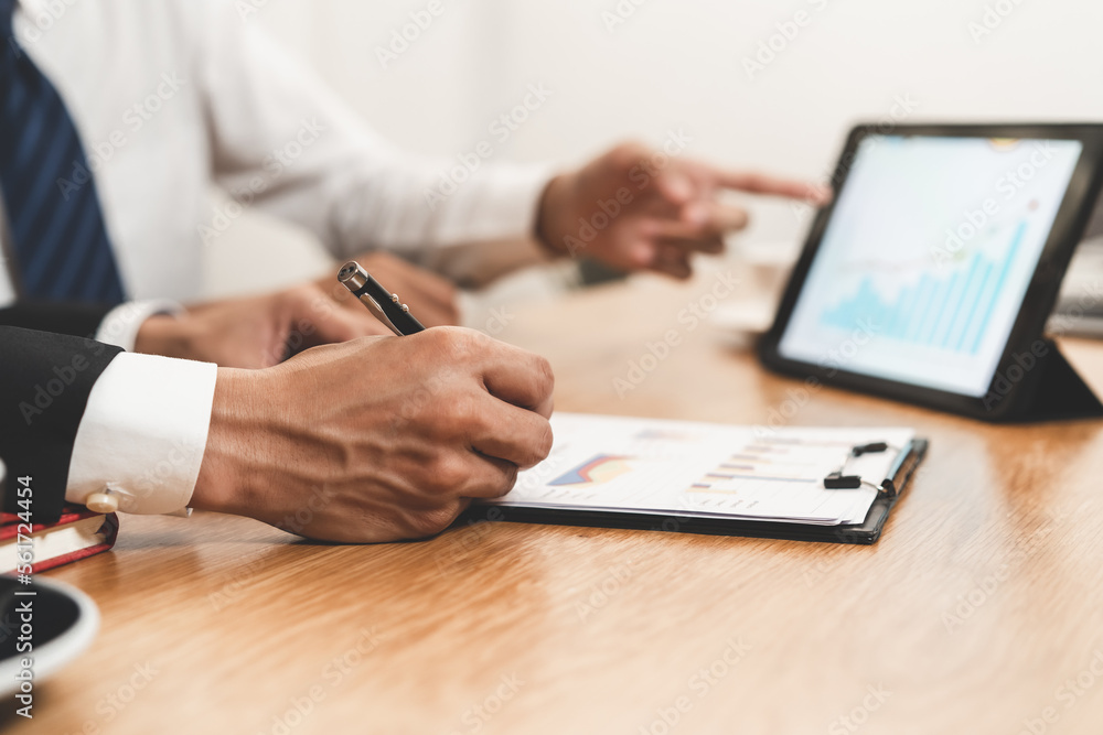 financial advisory services. Asian advisor showing plan of investment to clients in the consultancy office. financial advisory services. Asian advisor showing plan of investment to clients in the consultancy office.