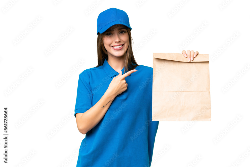 Young beautiful caucasian woman taking a bag of takeaway food over isolated background pointing to the side to present a product Young beautiful caucasian woman taking a bag of takeaway food over isolated background pointing to the side to present a product