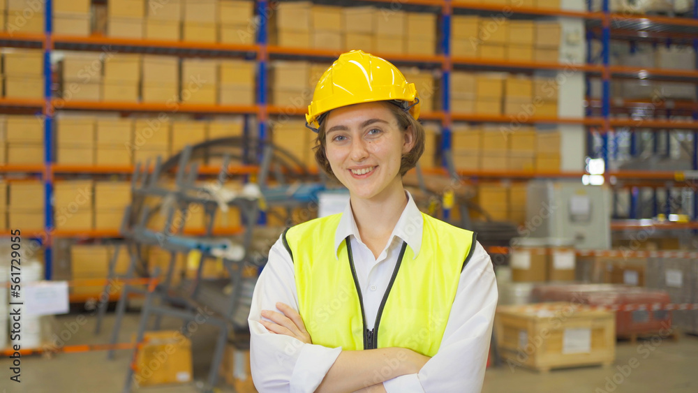 Portrait of caucasian worker working in large warehouse store industry.Rack of stock storage. Interior of cargo in logistic concept. Depot. People lifestyle. Shipment service for container Portrait of caucasian worker working in large warehouse store industry.Rack of stock storage. Interior of cargo in logistic concept. Depot. People lifestyle. Shipment service for container