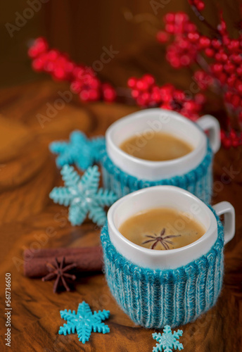 coffee with cardamom. winter drink. Coffee in cups with cardamom and white sugar on vintage wooden background