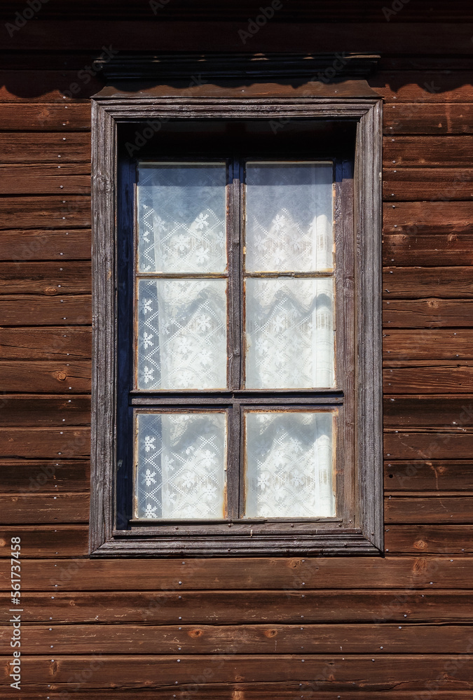windows on the wooden facade in bulgaria. architectural retro elemet background windows on the wooden facade in bulgaria. architectural retro elemet background