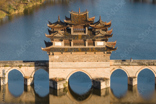 Double Dragon Bridge in,Jianshui Yunnan China, at sunset photo