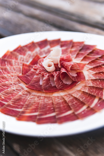 Elegantly presented plate of Iberian ham photo