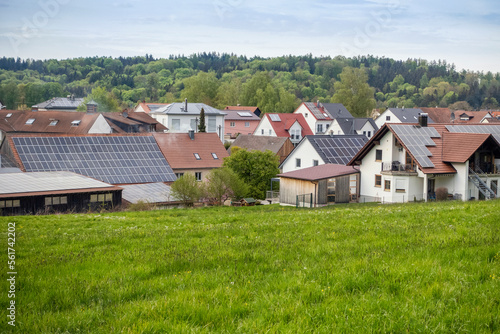 Wallpaper Mural Houses with solar panels in front of green field Torontodigital.ca