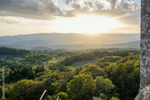 Green landscape of Casentino valley on sunset