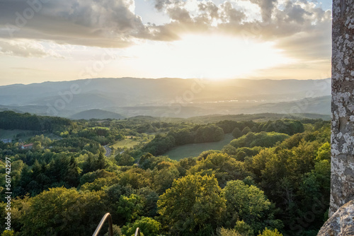 Green landscape of Casentino valley on sunset photo