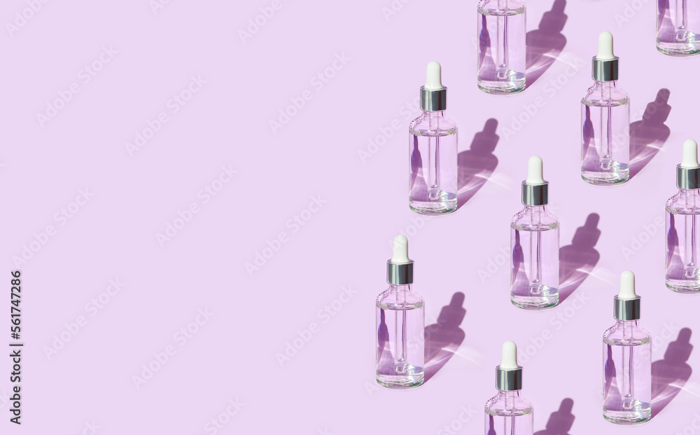 serum on a pink background with natural light serum on a pink background with natural light