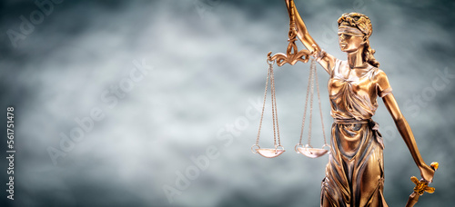 Legal and law background concept statue of Lady Justice with scales of justice