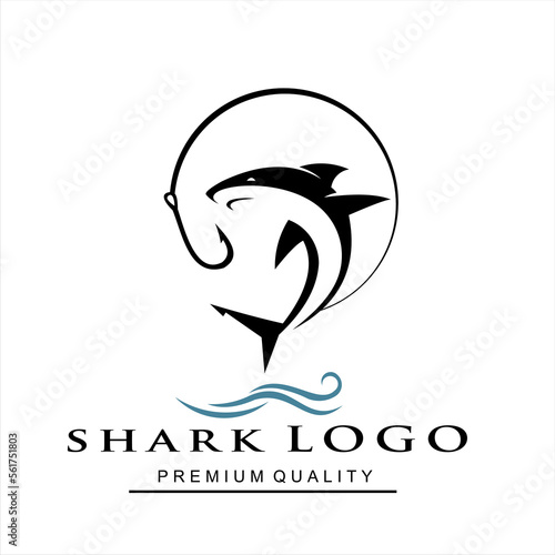 shark logo with hook and sea