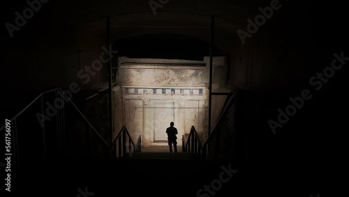 Silhouette Of A Person Standing In front Of Ancient Hellenistic Tomb 2  Archaeological Discovery  photo