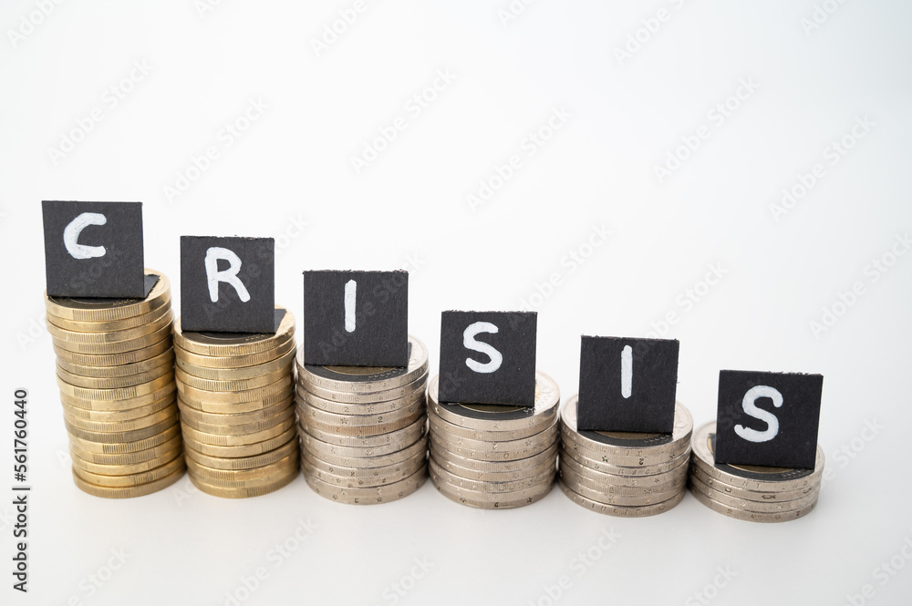 Stacks of coins of decreasing height and word 'crisis'. Economic crisis and its economic and social consequences.
Stacks of coins of decreasing height and word 'crisis'. Economic crisis and its economic and social consequences.