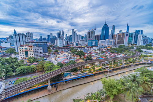 Canvas Print Timelapse 4k UHD footage of cityscape of Kuala Lumpur at during cloudy morning