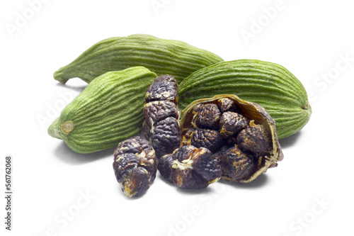 Whole green Cardamom, cardamon or cardamum (dried fruits of Elettaria cardamomum) with halved pod and seeds isolated png