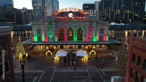 Aerial drone descending shot of Union Station lit up during a peaceful evening  photo